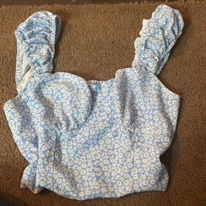 Baby blue little white flowers all over